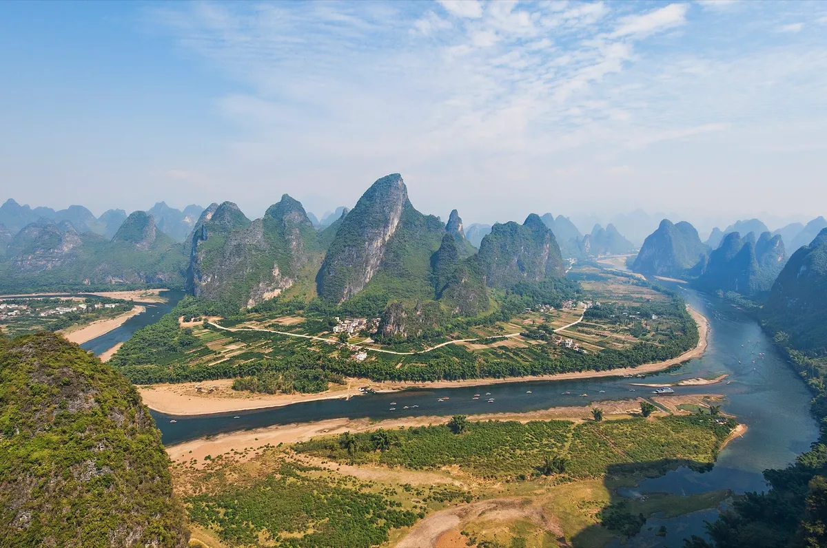 Karst mountains rising from the Li River near Guilin, China