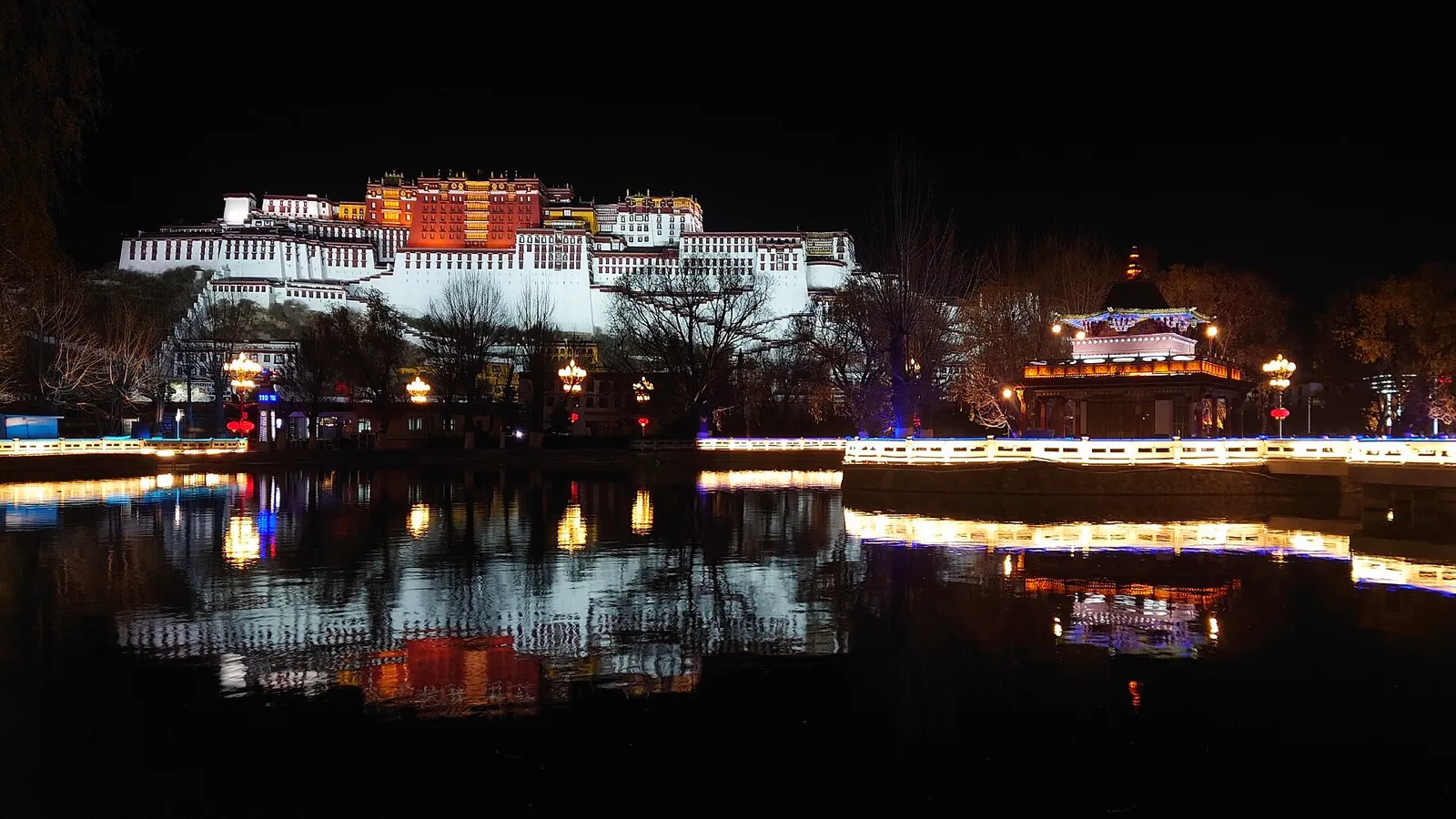 The Potala Palace rising above Lhasa under a deep blue Himalayan sky