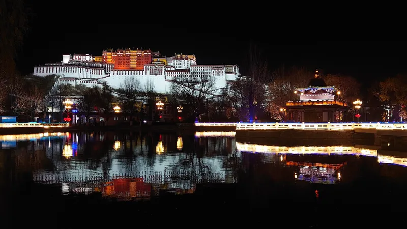 The Potala Palace rising above Lhasa under a deep blue Himalayan sky