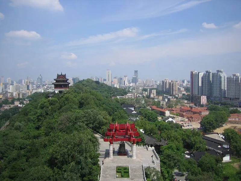 Yellow Crane Tower above the Yangtze with Wuhan's skyline and the first river bridge